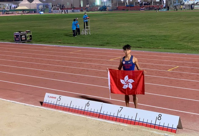 Yiu Pak-yu leapt 7.00 metres to claim bronze in Kuwait. Photo: HKAAA