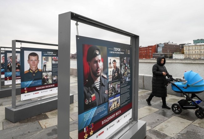 In Moscow, pictures of Russian servicemen who fought in Ukraine. Photo: EPA-EFE