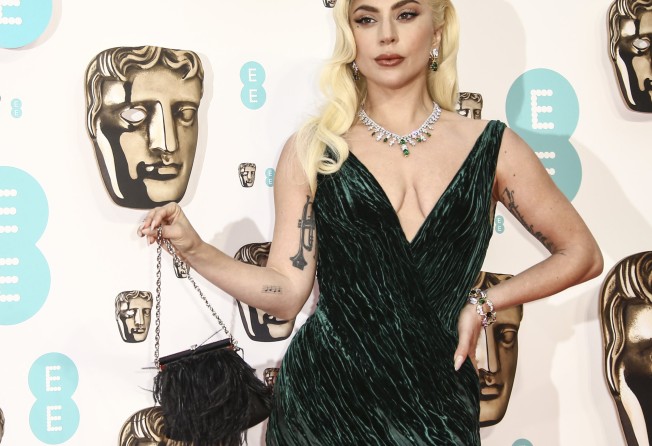 Lady Gaga poses for photographers upon arrival at the 75th BAFTAs, in London, on March 13. Photo: Invision/AP