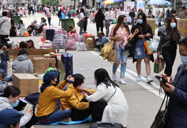 Foreign domestic helpers in Hong Kong’s Central business district on January 30. Photo: Nora Tam