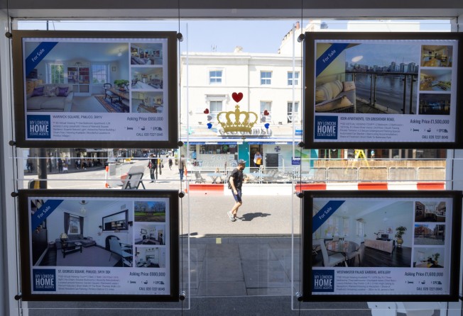 Homes advertised in the window of an property agents in London on June 20. House prices in the UK have soared during the pandemic. Photo: Bloomberg