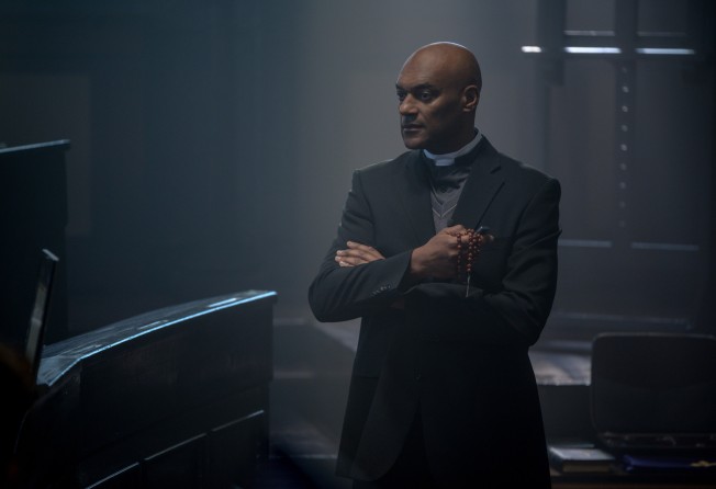 Colin Salmon as Father Quinn in a still from The Devil’s Light.