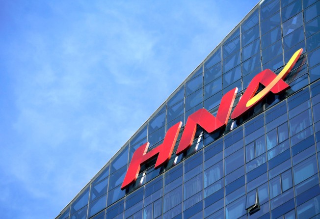 The logo of the HNA Group on the building of HNA Plaza in Beijing on February 9, 2018. Photo: Reuters
