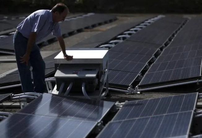 Tesla solar panels on top of a hospital roof in San Juan, Puerto Rico. Photo: Reuters
