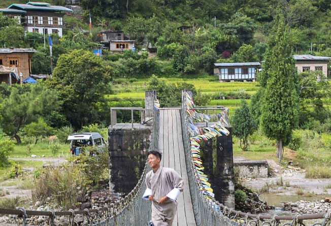 A suspension bridge crossing the Mo Chhu river. Photo: Tim Pile