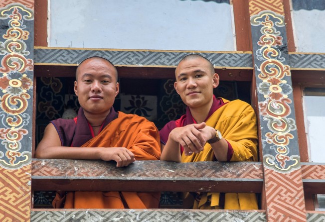 Few pictures taken in Bhutan won’t have a monk or two in them. Photo: Tim Pile