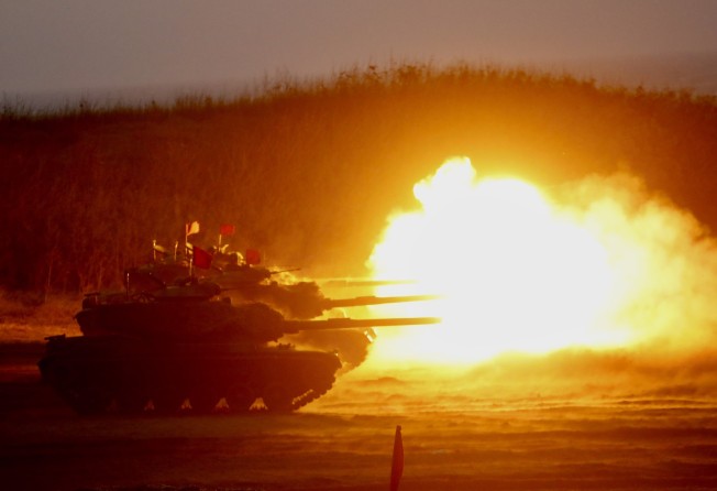 Taiwanese tanks during a live fire exercise in Penghu, Taiwan, in October. Photo: EPA-EFE