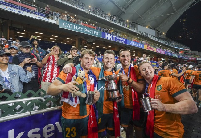 Australia’s players celebrate victory over Fiji. Photo: Sam Tsang