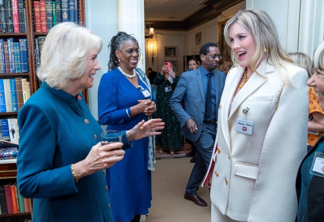 Camilla, then Duchess of Cornwall, met actress Emerald Fennell who portrayed her in The Crown during a reception for International Women’s Day. Photo: AFP