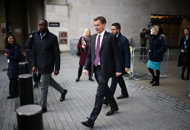British Chancellor of the Exchequer Jeremy Hunt leaves the BBC headquarters in London this month. Photo: Reuters
