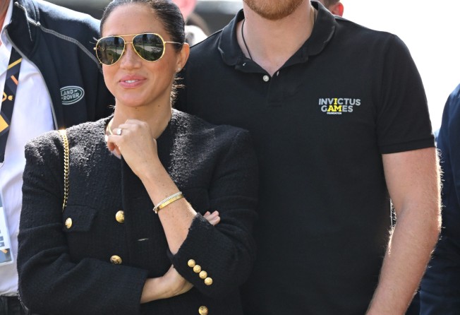 Prince Harry and Meghan Markle attend an athletics event at the Invictus Games in the Netherlands earlier this year. Photo: WireImage