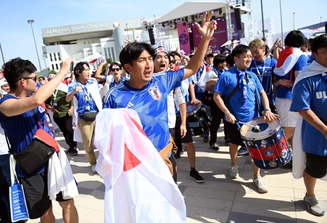 Japan supporters make their way to the Ahmad bin Ali Stadium in Doha ahead of their side’s Group E match against Costa Rica. Photo: EPA-EFE