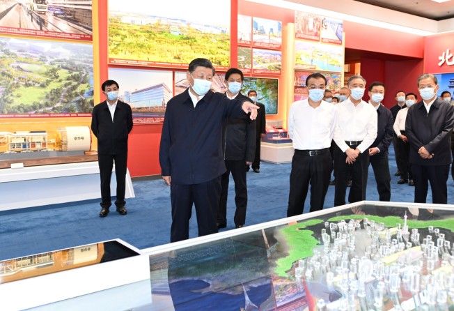 President Xi Jinping, Premier Li Keqiang and other top Chinese leaders at the “Forging Ahead in the New Era” exhibition in Beijing in September 27. Photo: Xinhua