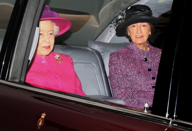 Britain’s Queen Elizabeth, left, and her then-lady-in-waiting, Lady Susan Hussey, arriving at St Mary Magdalene Church, on the royal estate at Sandringham in Norfolk, England, in January 2011. Photo: AP