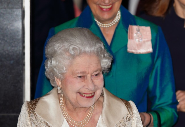 Queen Elizabeth accompanied by her lady-in-waiting Lady Susan Hussey as they depart after attending the Gold Service Scholarship awards ceremony at Claridge’s in February 2016, in London, England. Photo: Getty Images