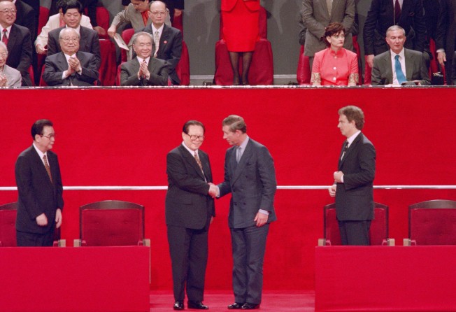 China’s then-president Jiang Zemin (centre left) shakes hands with Britain’s then Prince Charles during a ceremony in Hong Kong marking the return of the city to Chinese rule on July 1, 1997. Photo: AFP