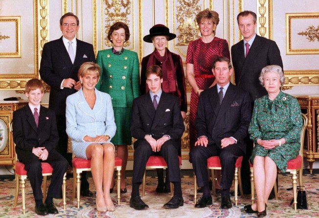 From left front, Britain’s Prince Harry, Princess Diana, Prince William, Prince Charles and Queen Elizabeth; from left top, King Constantine, Lady Susan Hussey, Princess Alexandra, the Duchess of Westminster and Lord Romsey in 1997. Photo: AP