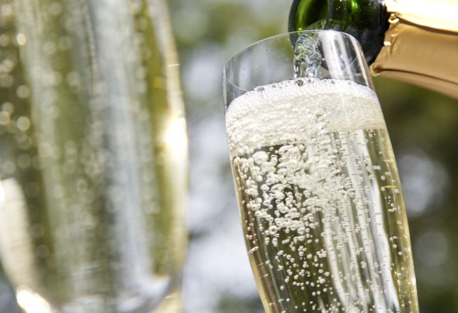 Champagne is widely enjoyed during the holidays, but there are many cheaper, delicious sparkling wine alternatives available. Photo: Ableimages