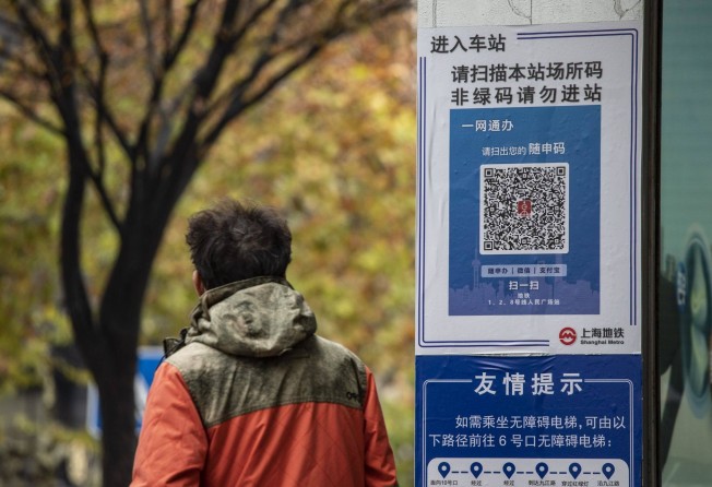 A QR code for Covid-19 contact tracing displayed at the entrance to a subway station in Shanghai on Monday. Photo: Bloomberg