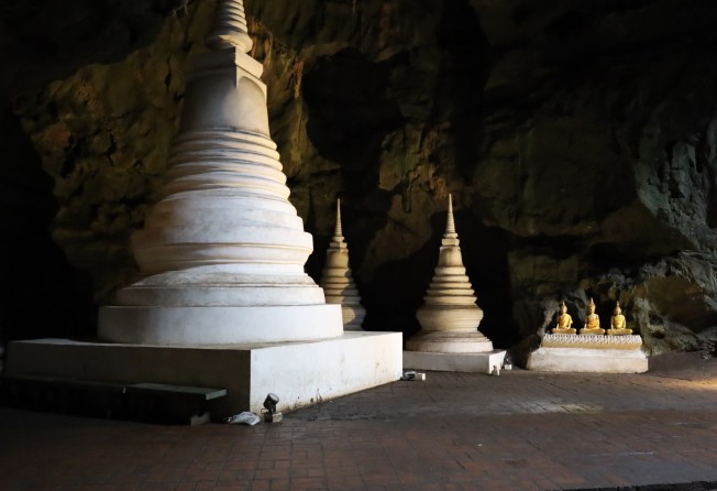 Chedis inside the Tham Khao Luang cave. Photo: Thomas Bird