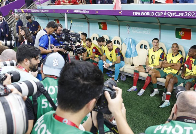 Cristiano Ronaldo (third from right) was centre of attention even when benched. Photo: Kyodo