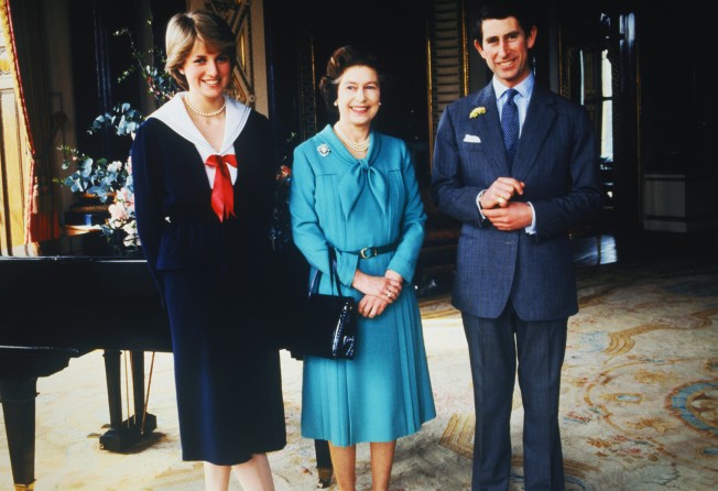 Lady Diana Spencer and Prince Charles pose with Queen Elizabeth at Buckingham Palace, in 1981 – the day that their wedding was sanctioned by the Privy Council. Photo: Bettmann Archive