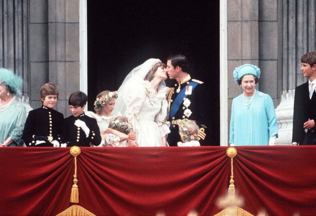 Prince Charles and Princess Diana on the balcony of Buckingham Palace, in 1981, surrounded by their bridesmaids and pageboys as well as Queen Elizabeth, Prince Edward and the Queen Mother. Photo: Getty Images