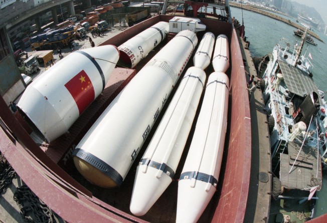 The Long March rocket from China’s space programme arrives by barge at North Point, Hong Kong, in 1996. Photo: David Wong