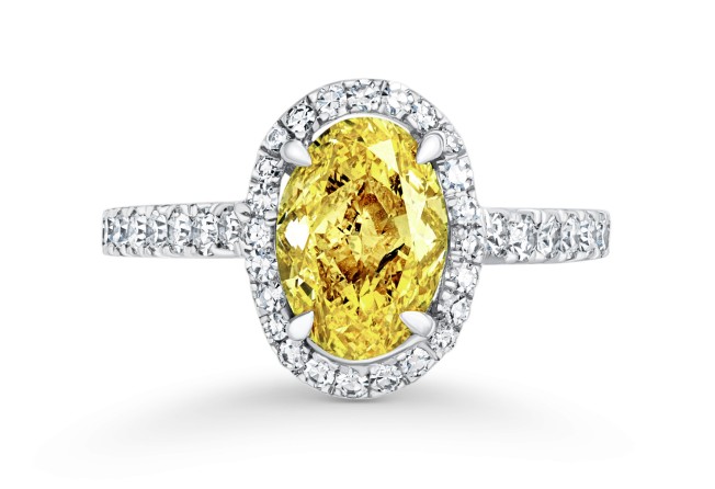 David Morris oval fancy intense yellow diamond ring.