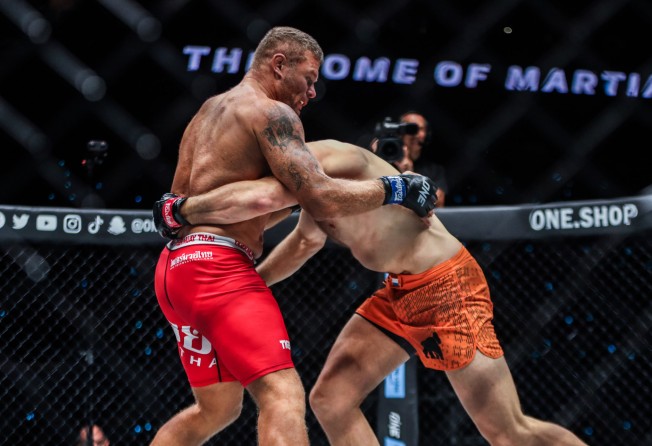 Anatoly Malykhin (left) defends a takedown from Reinier de Ridder at ONE on Prime Video 5.