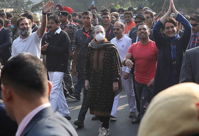 Indian Congress party senior leaders Rahul Gandhi (left), Sonia Gandhi (centre) and Priyanka Gandhi (right) during the “Bharat Jodo Yatra”, or “Unite India March”, in New Delhi on Saturday. Photo: EPA-EFE