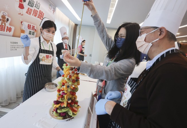 Hospital staff compete to build the tastiest Christmas. Photo: Jonathan Wong