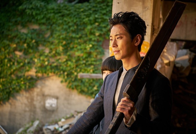Ju Ji-hoon in a still from Along with the Gods. Photo: Realies Pictures