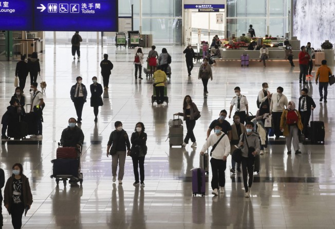 Travellers arrive at Hong Kong International Airport on Thursday. Photo: Jonathan Wong
