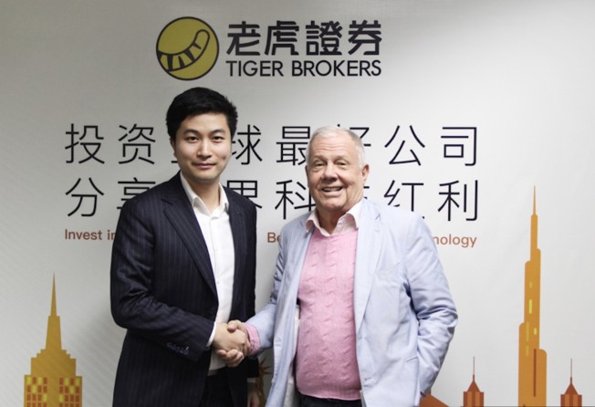 Tiger Brokers’ chief executive Wu Tianhua (left) and Jim Rogers (right), the chairman and chief executive of Rogers Holdings, on July 11, 2017. Photo: Tiger Brokers