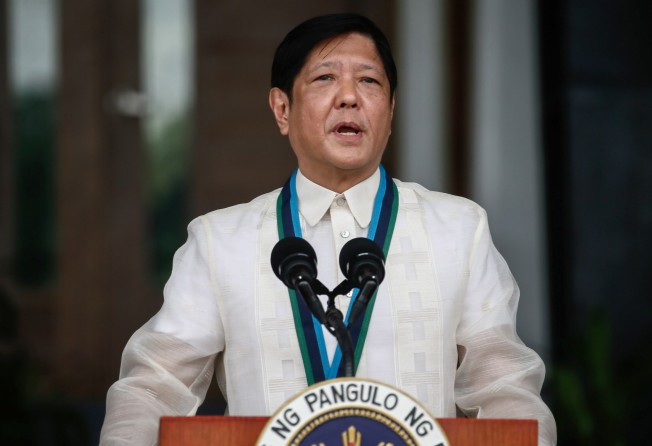 President Ferdinand Marcos Jnr recently signed a law requiring all SIM cards to be registered in a bid to crack down on mobile-phone scams and other crimes. Photo: EPA-EFE