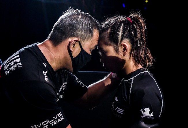 Ken Lee speaks to Victoria Lee before her fight at Fists of Fury.