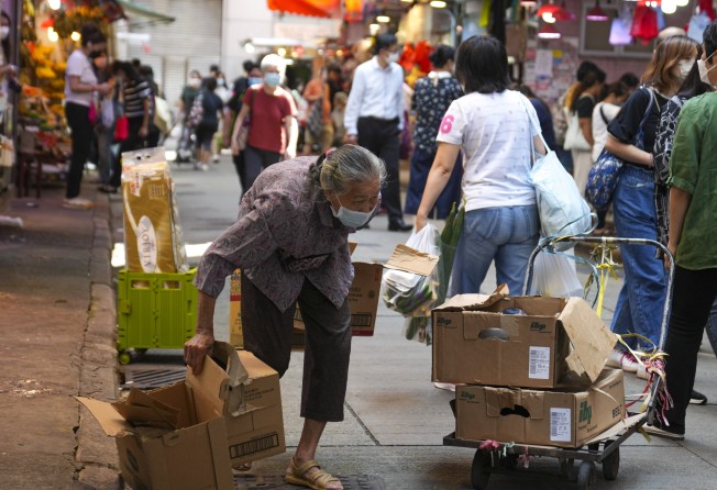 Grass-roots elderly working in Wan Chai. For Hong Kong’s minimum wage earners, the first increase in four years is not even enough for a fast-food meal. Photo: Sam Tsang