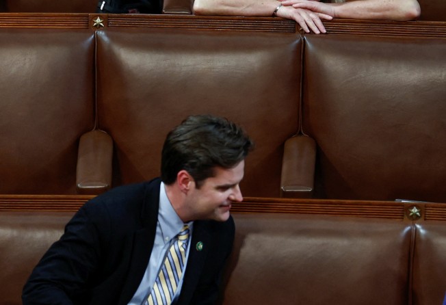 US Representative Matt Gaetz enjoys a light moment with Representative Marjorie Taylor Greene shortly before he nominated former president Donald Trump for speaker of the House, in Washington on January 5. Photo: Reuters