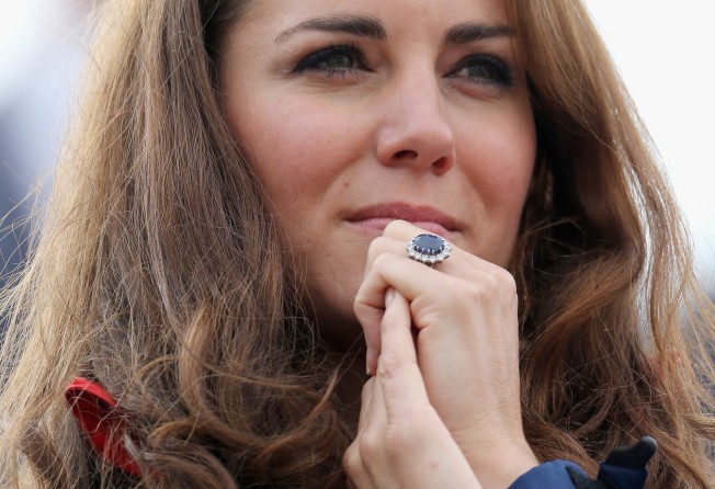 Catherine, Duchess of Cambridge watches Great Britain Mixed Coxed Four Rowing LTAMix4+ team celebrate after winning gold on day four of the London 2012 Paralympic Games at Eton Dorney in September 2012, in Windsor, England. Photo: Getty Images