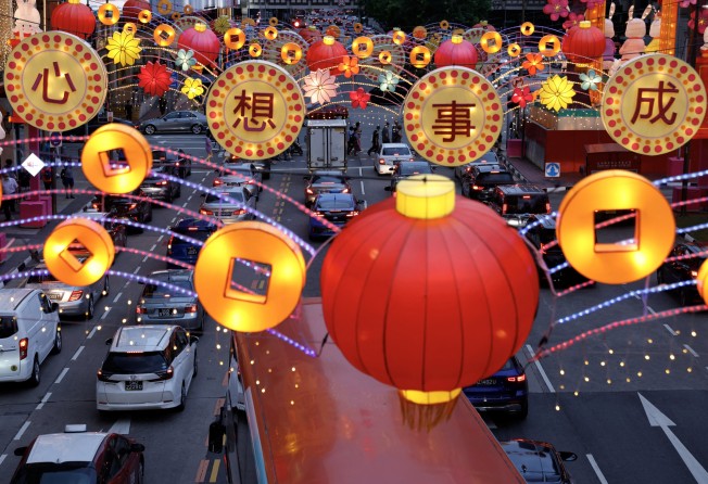 Festive greetings adorn a street at Chinatown ahead of the Lunar New Year in Singapore. Photo: Reuters