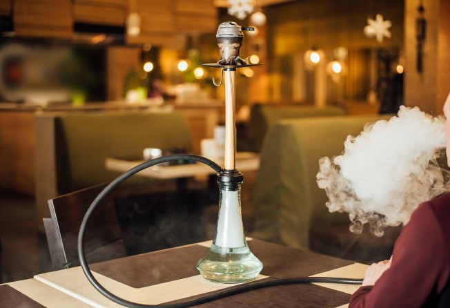 A typical one-hour water-pipe smoking session exposes the user to 100-200 times the volume of smoke inhaled from a single conventional cigarette, the Centre for Health Protection says. Photo: Shutterstock