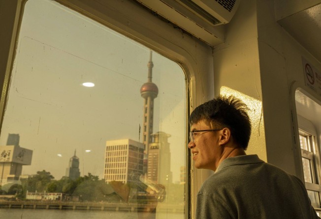 A passenger rides a ferry crossing the Huangpu River in Shanghai, China, on Friday, June 2, 2023. Chinese companies raised a combined US$31.3 billion from IPO flotations on the Shanghai, Shenzhen and Beijing exchanges in the six months to June. Photo: Bloomberg