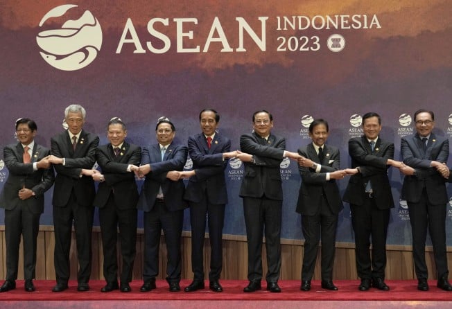 Asean leaders shake hands for a family photo before a summit session in Jakarta, Indonesia, in September last year. Photo: AP