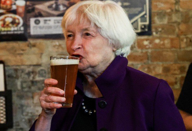 US Treasury secretary Janet Yellen tastes a glass of beer at Jing-A Brewing Co in Beijing. Chinese internet users and politicians have been obsessed with what Yellen is eating and drinking in China. Photo: Reuters