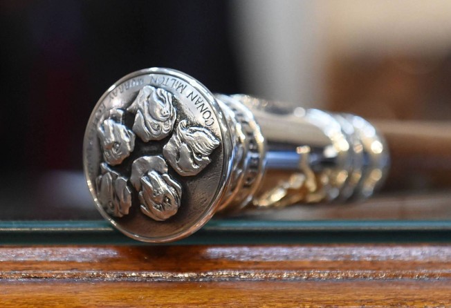 Five dogs belonging to Argentine leader Javier Milei have been engraved on the presidential baton. Photo: Luciano Ingaramo/Argentina’s Senate via AFP