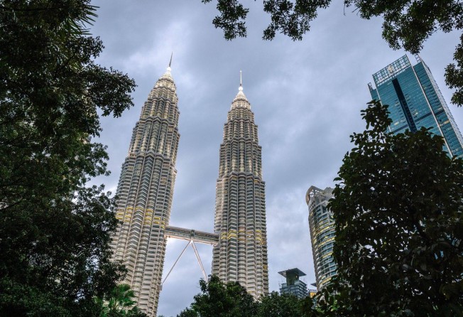 Petronas Twin Towers in Kuala Lumpur. Nuon Toeun, 36, who had worked in Malaysia for several years, was arrested last week by Malaysian authorities following a request from the Cambodian government. Photo: Bloomberg