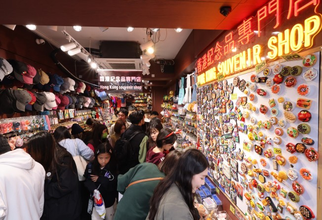 Tourists shop on Christmas Day. Photo: Nora Tam