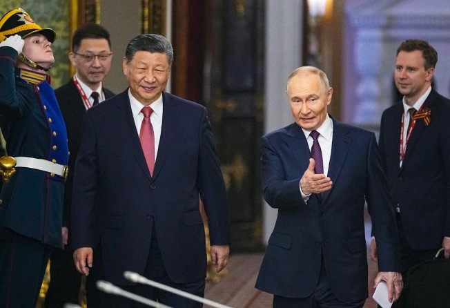 China’s President Xi Jinping and his Russian counterpart Vladimir Putin arrive for their talks at the Kremlin on Thursday. Photo: AFP