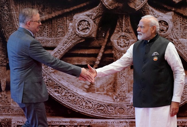 Indian Prime Minister Narendra Modi shakes hands with Australian Prime Minister Anthony Albanese at a G20 summit in 2023. Photo: Reuters